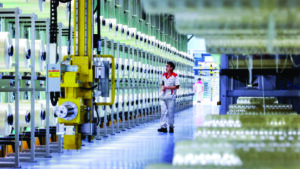 China factory activity grows faster than expected in June on tech export demand.